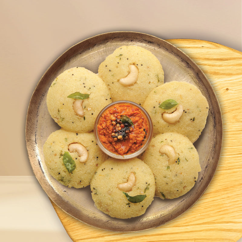 Millet Rava Idli plated on a traditional brass plate for breakfas